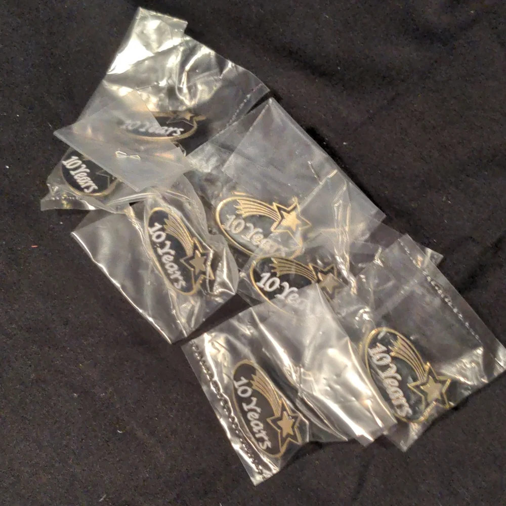 Bundle of 7 Crown Awards Ten Years Pin